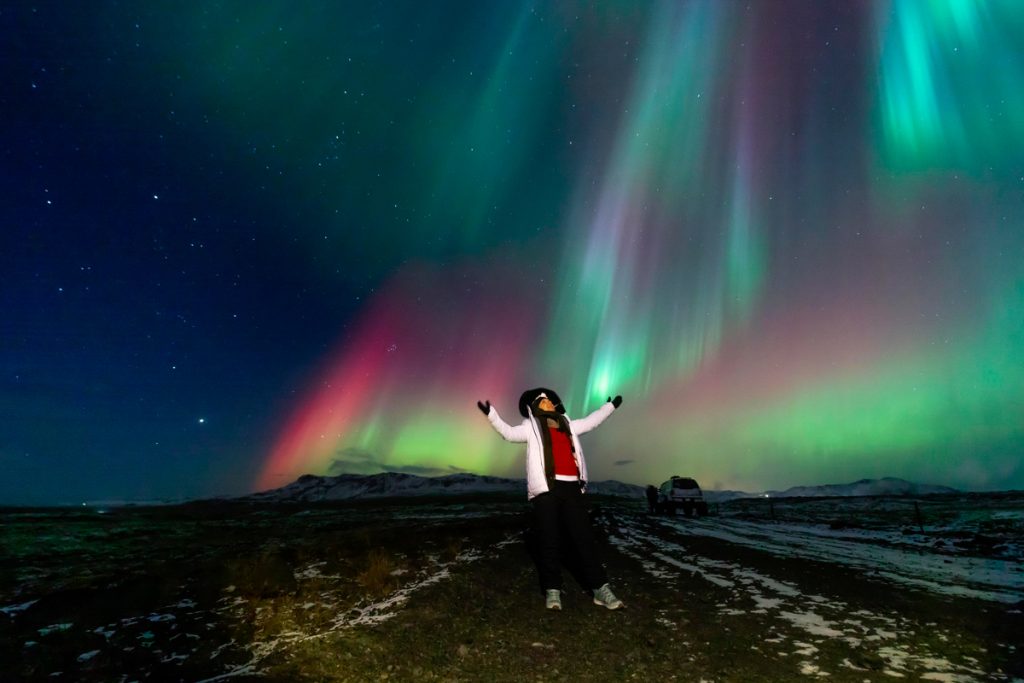 Viajante da Expedição Islândia® na Aurora Boreal